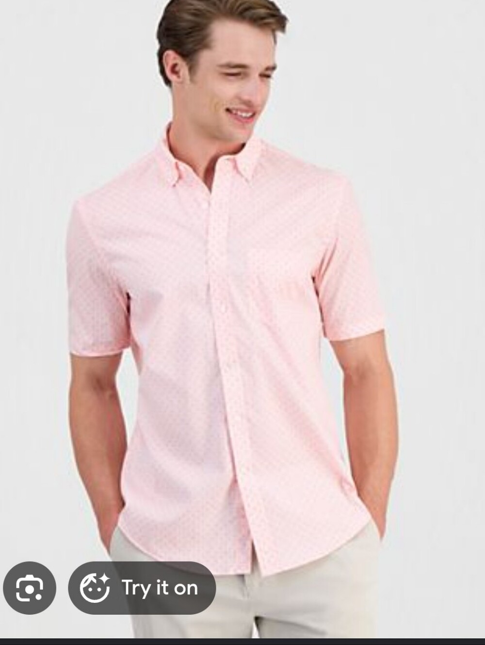 H&M short-sleeve button-down shirt is styled in a light pink color
